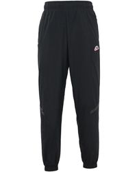 Nike - Sportswear Windrunner Woven Breathable Bundle Feet Sports Long Pants - Lyst