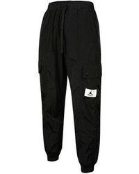 Nike - (Wmns) Essentials Pocket Woven Label Logo Drawstring Bundle Feet Sports Pants/Trousers/Joggers - Lyst
