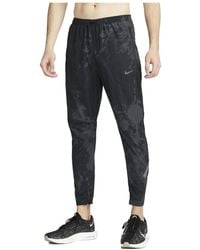Nike - Reflective Quick-Drying Running Training Breathable Sports Cuff Pants - Lyst