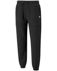 PUMA - Logo Downtown Sweatpants - Lyst