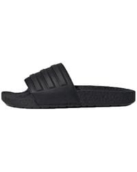 adidas - Adilette Boost Slides 'Triple' - Lyst