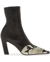 Khaite - The Dallas Stretch Ankle Boot - Lyst