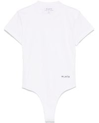 Alaïa - Logo-Embroidered Close Fit Bodysuit T-Shirt - Lyst