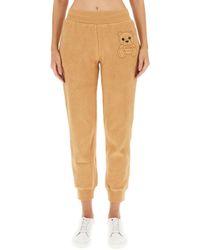 Moschino - Stylish Jogging Pants With Embossed Logo - Lyst