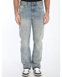 Amiri - Released Hem Jeans - Lyst