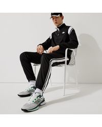 Lacoste Trainingsanzug mit Colorblocks Schwarz - RUGA