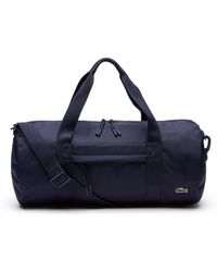 Lacoste Holdalls and weekend bags for 