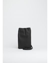 The Row - Bourse Phone Case - Lyst