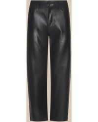 L'Agence - Mallis Coated Bow-Leg Jean - Lyst