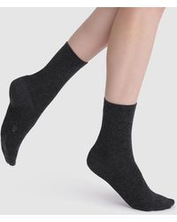 DIM - Calcetines medios de punto fino - Lyst