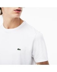 Lacoste - Camiseta de punto de algodón, con cuello redondo - Lyst