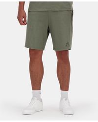Le Coq Sportif - Pantalón corto deportivo con logotipo tono sobre tono - Lyst
