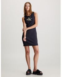 Calvin Klein - Vestido corto, sin mangas y ajustado de punto - Lyst