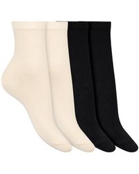 DIM - Lote de 4 pares de calcetines de altura media THERMO POLAIRE - Lyst
