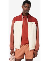 Lacoste - Chaqueta de chándal en bloques de color - Lyst