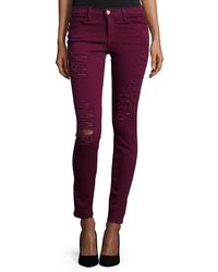 dark colored ripped jeans
