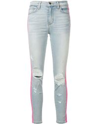 female amiri jeans