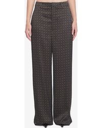Saint Laurent - Medallion Pattern Trousers - Lyst