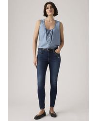 Levi's - 710 Mid Rise Super Skinny Jeans - Lyst