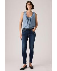 Levi's - 710 Mid Rise Super Skinny Jeans - Lyst