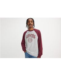 Levi's - T shirt mit grafik und langen raglanärmeln - Lyst