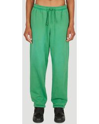 Green Jogging bottoms for Men | Lyst 