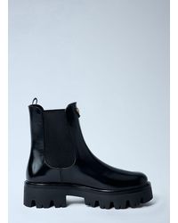 Prada - Logo Plaque Ankle Boots - Lyst