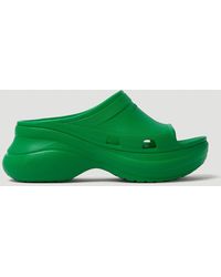 green platform crocs