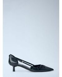 Prada - Side-Open Leather Pumps - Lyst
