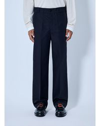 Prada - Canvas Logo-Plaque Trousers - Lyst
