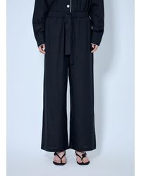 TOTEME - Piped Silk Trousers - Lyst