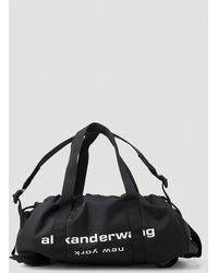 Alexander Wang Synthetic Primal Drawstring Nylon Duffle Bag in Black Womens Bags Duffel bags and weekend bags 