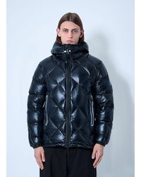 and wander - Hooded Quilted Down Jacket - Lyst