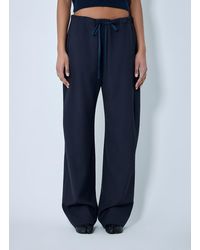 KHAITE - Rohen Drawstring Pants - Lyst