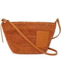 Loewe - Luxury Slit Pochette Bag In Raffia And Calfskin - Lyst