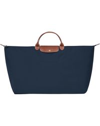 Bolsas y bolsos de viaje en Azul de mujer | Lyst