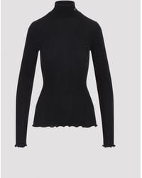 Prada - Ribbed Knit Turtleneck Top - Lyst