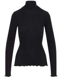 Prada - Ribbed Knit Turtleneck Top - Lyst