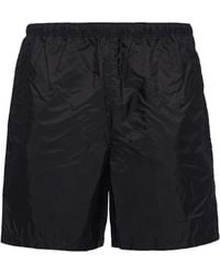 Prada - Logo-Plaque Swim Shorts - Lyst