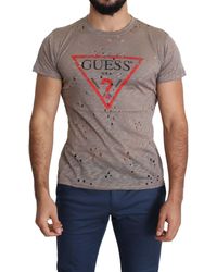 Édition Exclusive Uomo Vestiti Top e t-shirt T-shirt T-shirt a righe GUESS T-shirt a righe Tee-Shirt Guess 