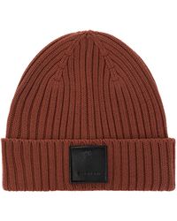 Givenchy Knit Beanie In Fuschia At Nordstrom Rack in Red | Lyst