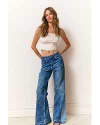 LoveShackFancy - Ambrina Bow Print Wide Leg Jeans For - Lyst