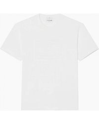 Lacoste - Embossed Polo T-Shirt - Lyst