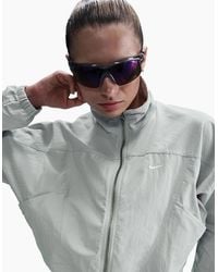 Nike - Everything Solid Patterned Front Zip Pocket Windbreaker Jacket - Lyst