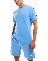 Nike - T-Shirts Tape Repeat Fleece Cotton Top - Lyst