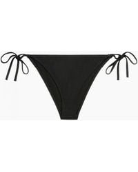 Calvin Klein - Swimwear Intense Power String Side Tie Cheeky Bikini Bottoms - Lyst