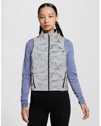 Nike - Abstract Patterned Two Zip Pocket Waist Coat - Lyst