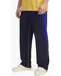 Under Armour - Solid Patterned Tricot Track Pants - Lyst