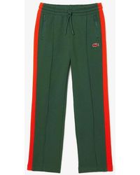 Lacoste - Vertical Stripe Track Pants With Zipped Pockets - Lyst