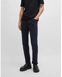 BOSS - Tapered Fit Five Pocket Jeans - Lyst